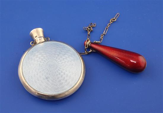 A late 19th/early 20th century Viennese silver and blue guilloche enamel moon shaped scent flask, 1.5in.